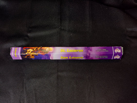 Pack of St. Lazarus incense sticks on a black background