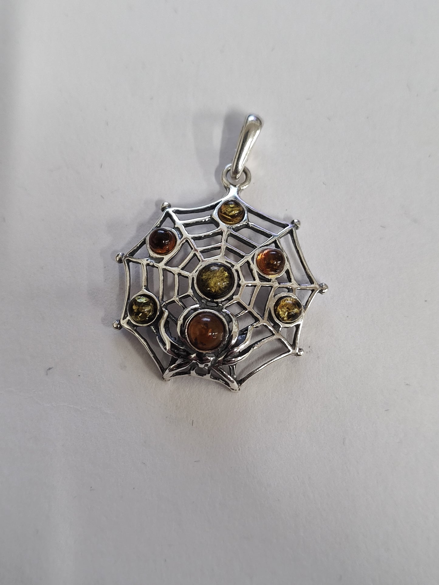 Baltic Amber in Sterling Silver Web Inlay