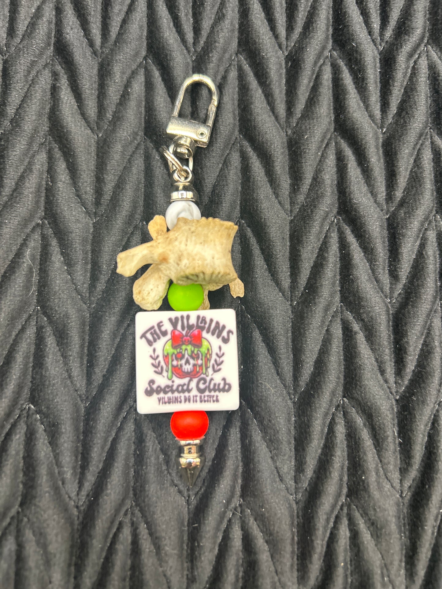 Vertebrae Keychain ("The Villians Social Club")