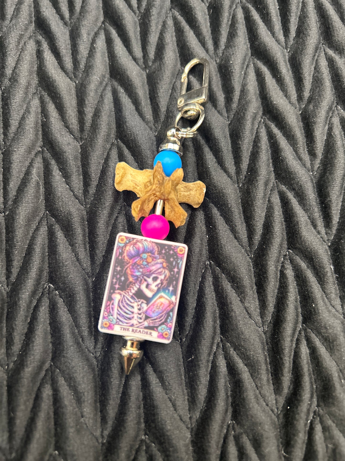 Vertebrae Keychain ("The Reader")