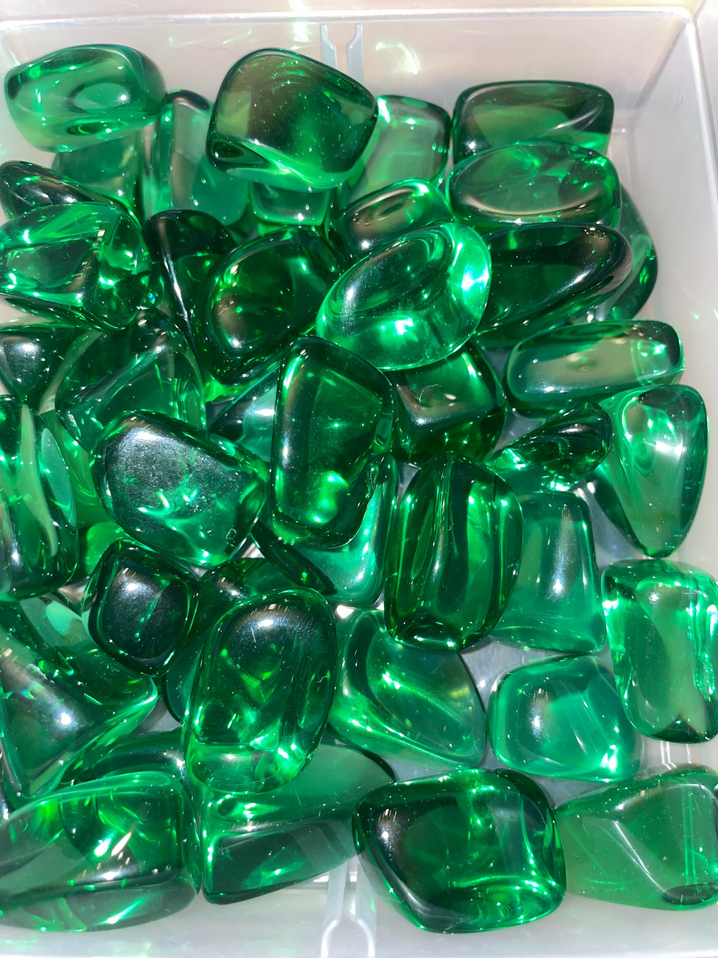 Green obsidian tumble (man-made)