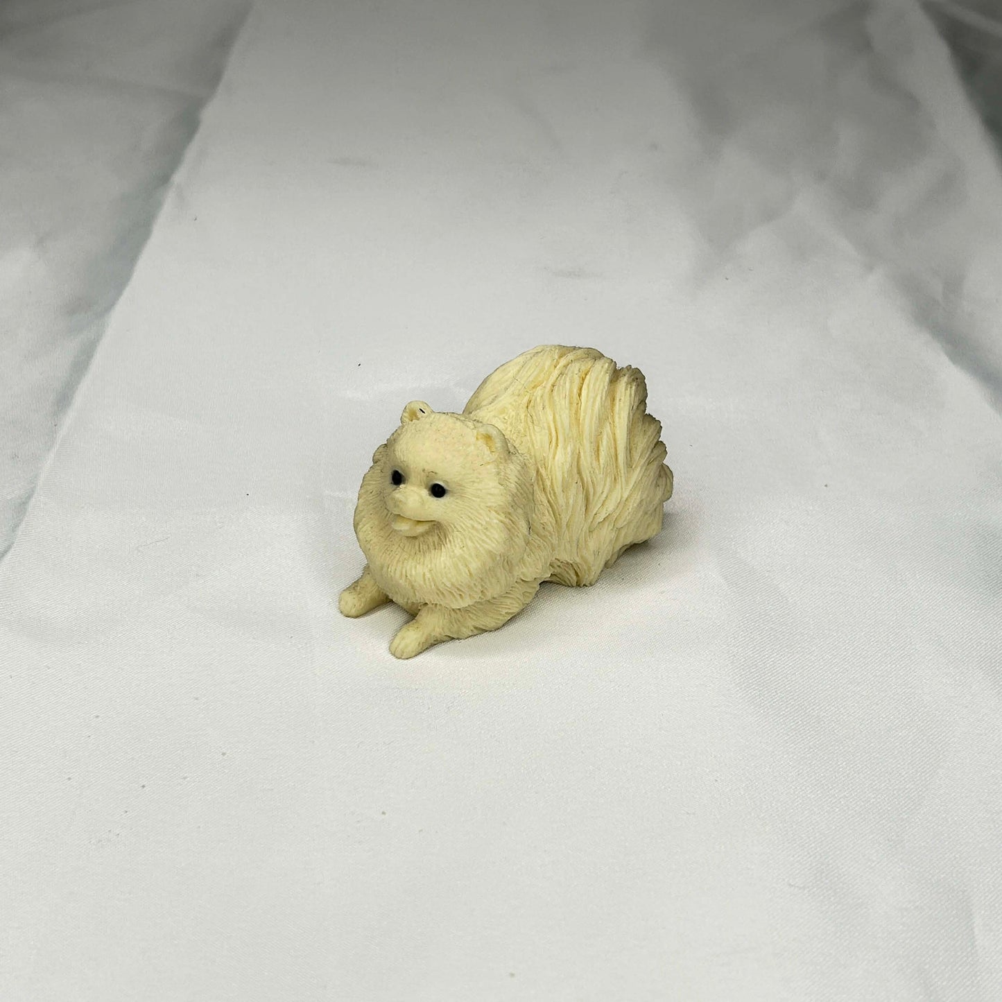 Porcelain Pomeranian Statue