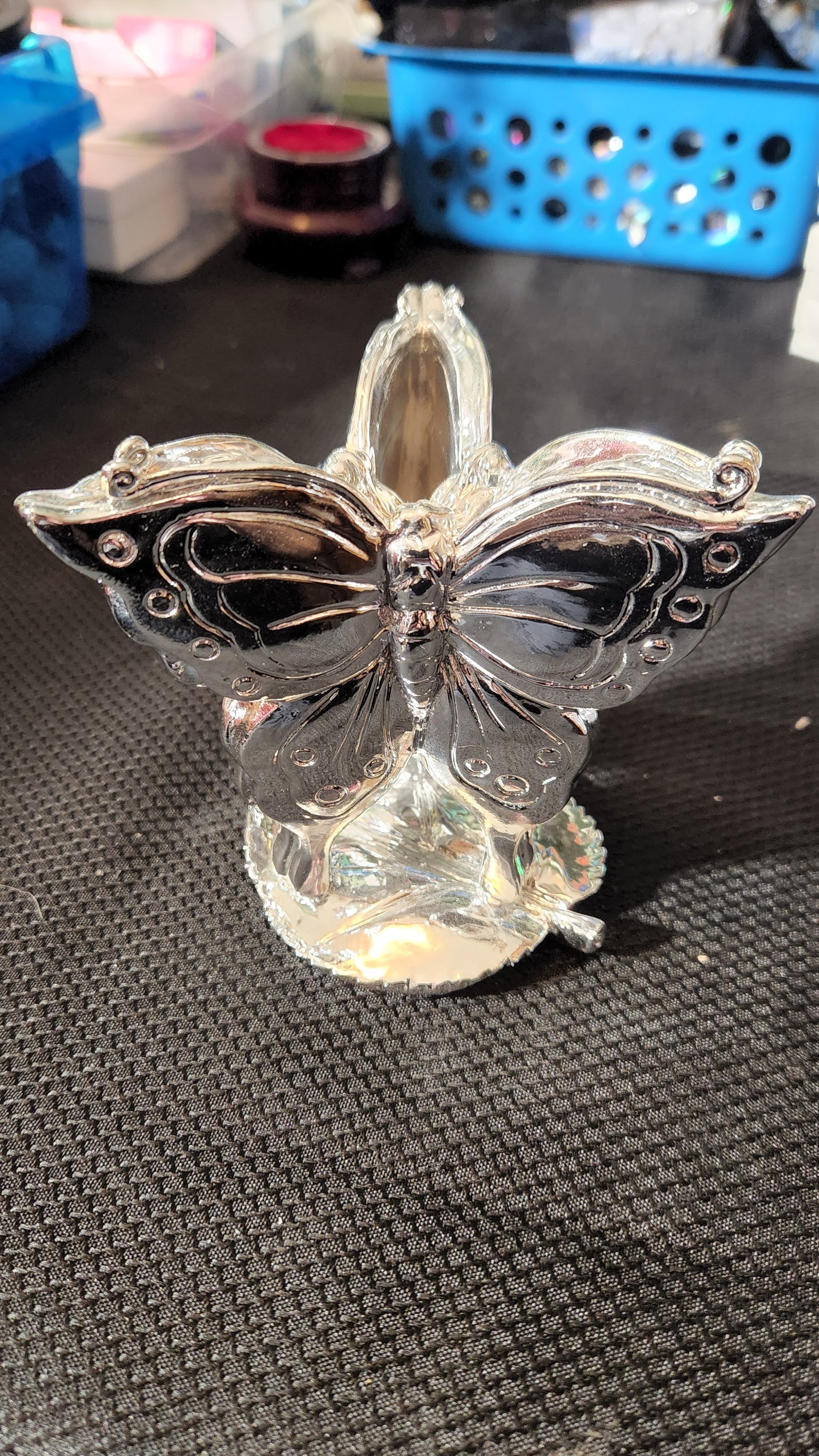 Silver butterfly sphere holder