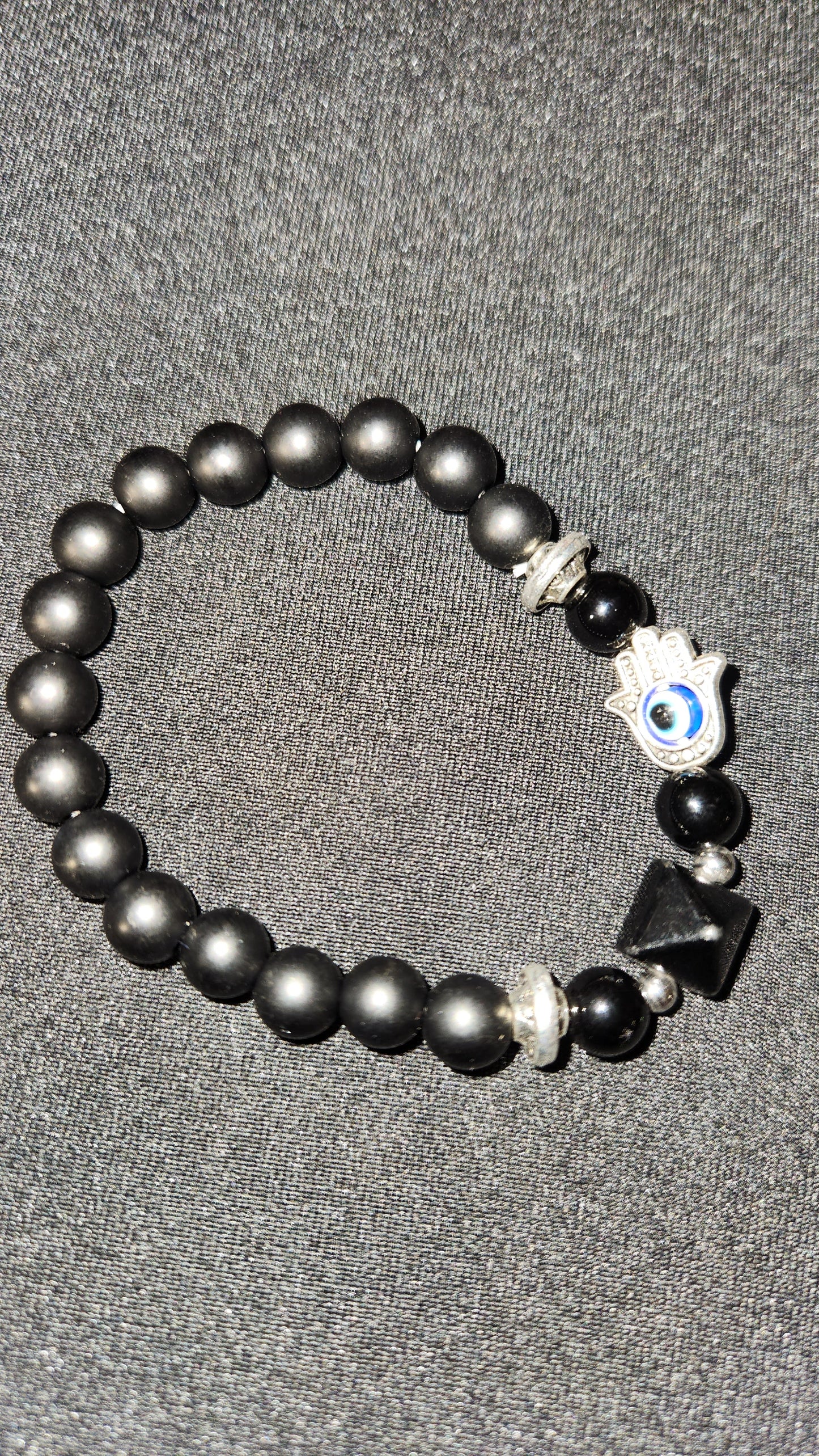 Hamsa hand with black obsidian bracelet