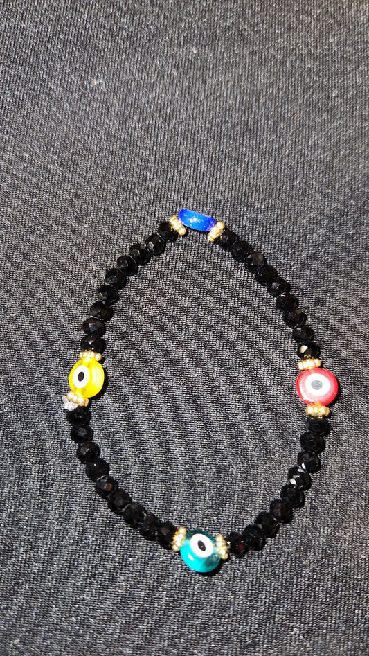 Multi colored evil eye with black beads