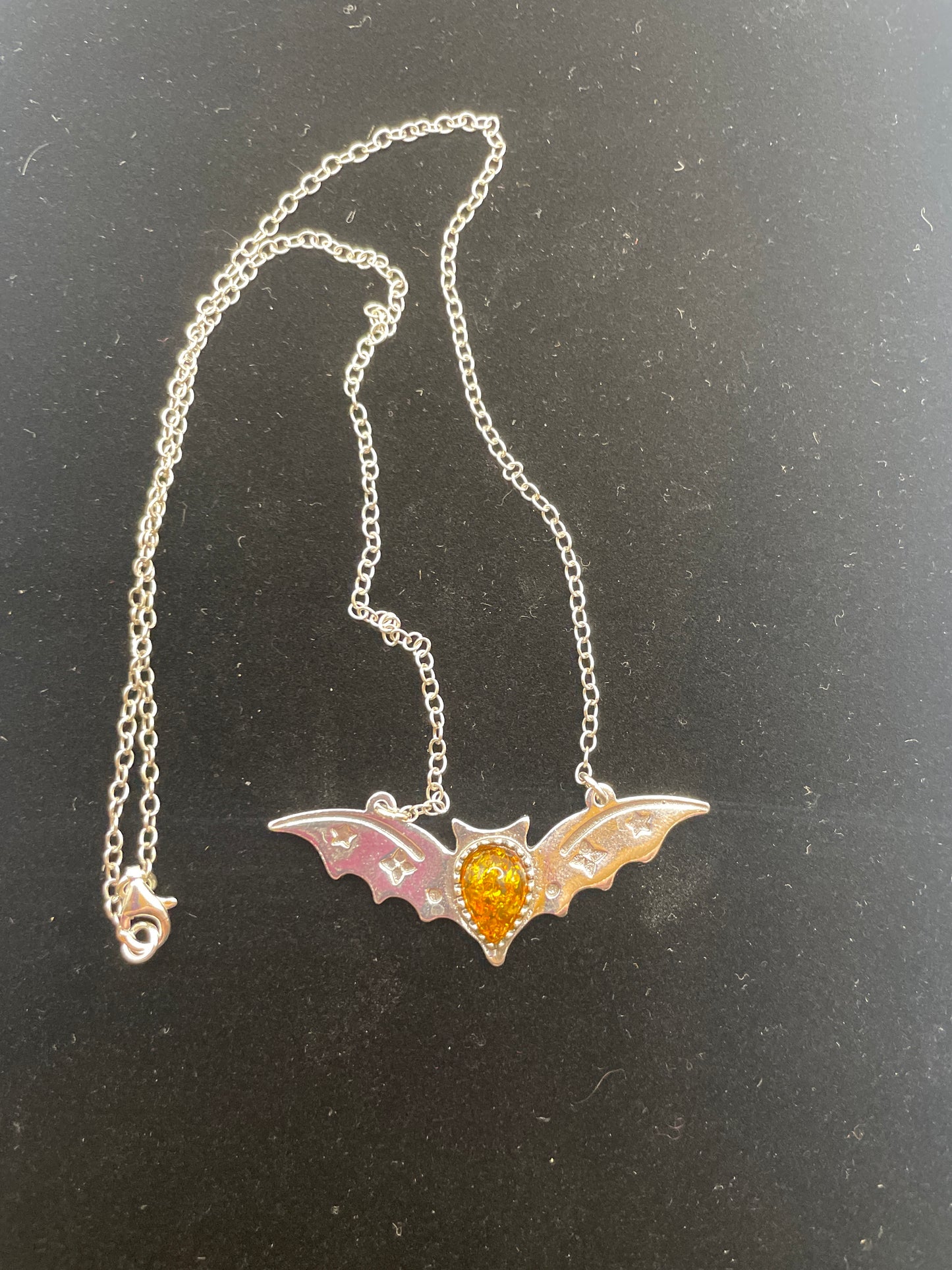 Sterling silver Baltic amber Bat with attached chain