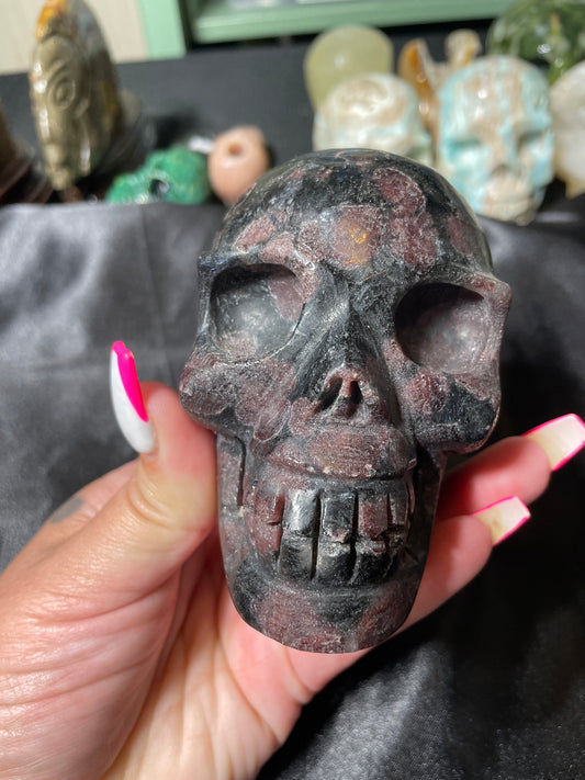 4.5" Garnet in Arfvedsonite Skull