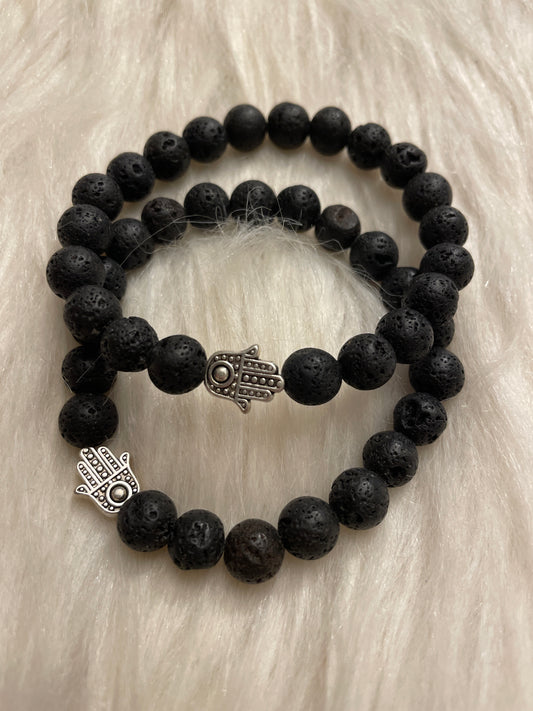 Lave stone bracelet with hamsa hand