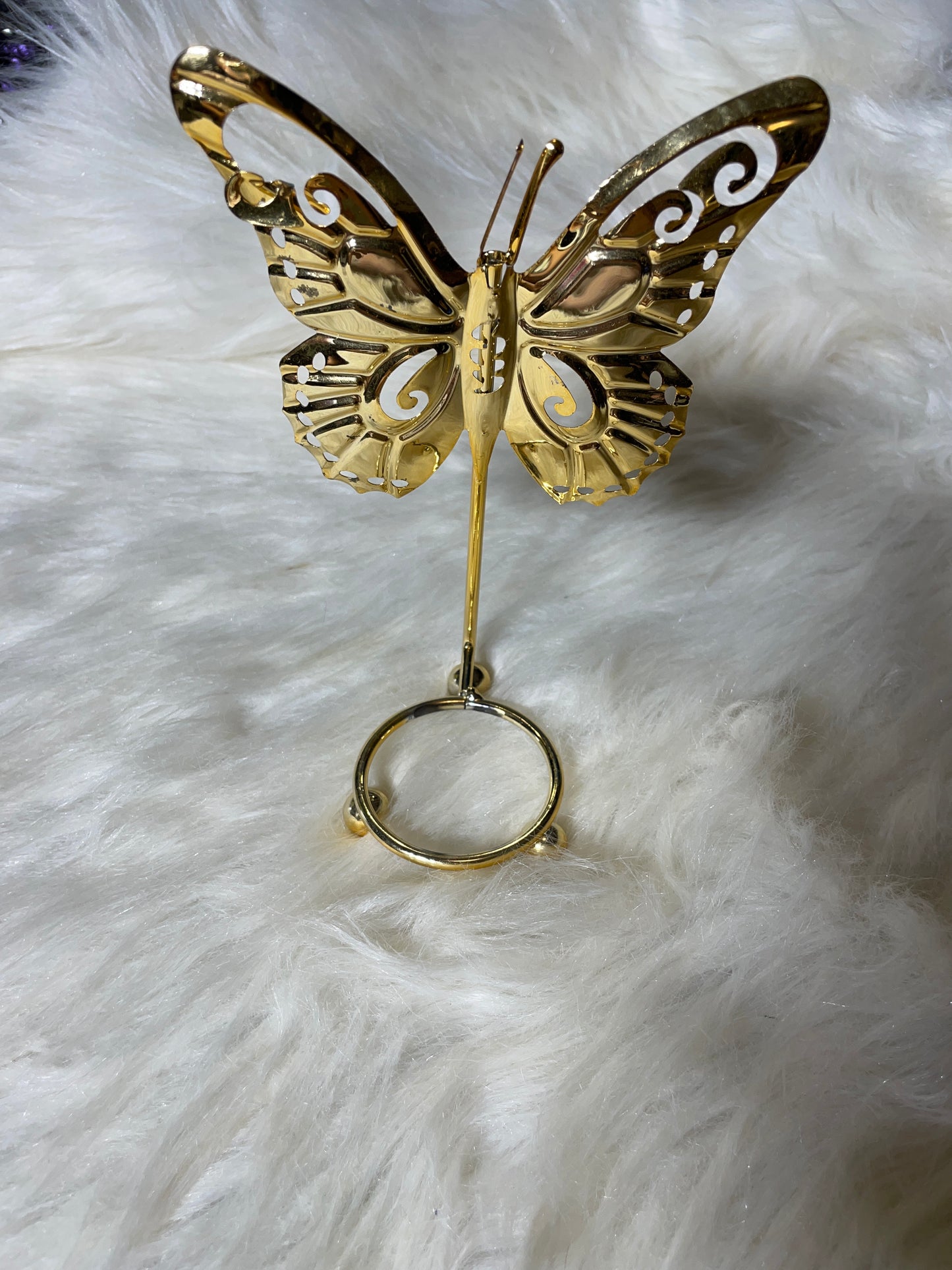 Gold butterfly sphere holder