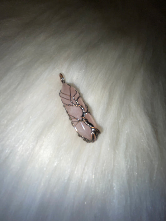 Wired wrapped rose quartz pendent copper tone