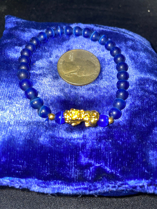 Dark blue cats eye with golden pixiu charm bracelet