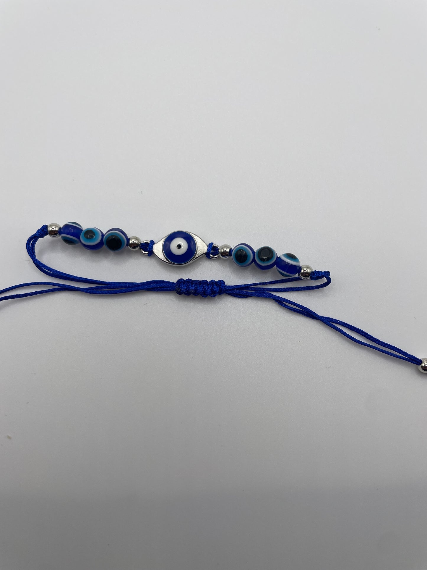 Evil eye pull cord bracelet