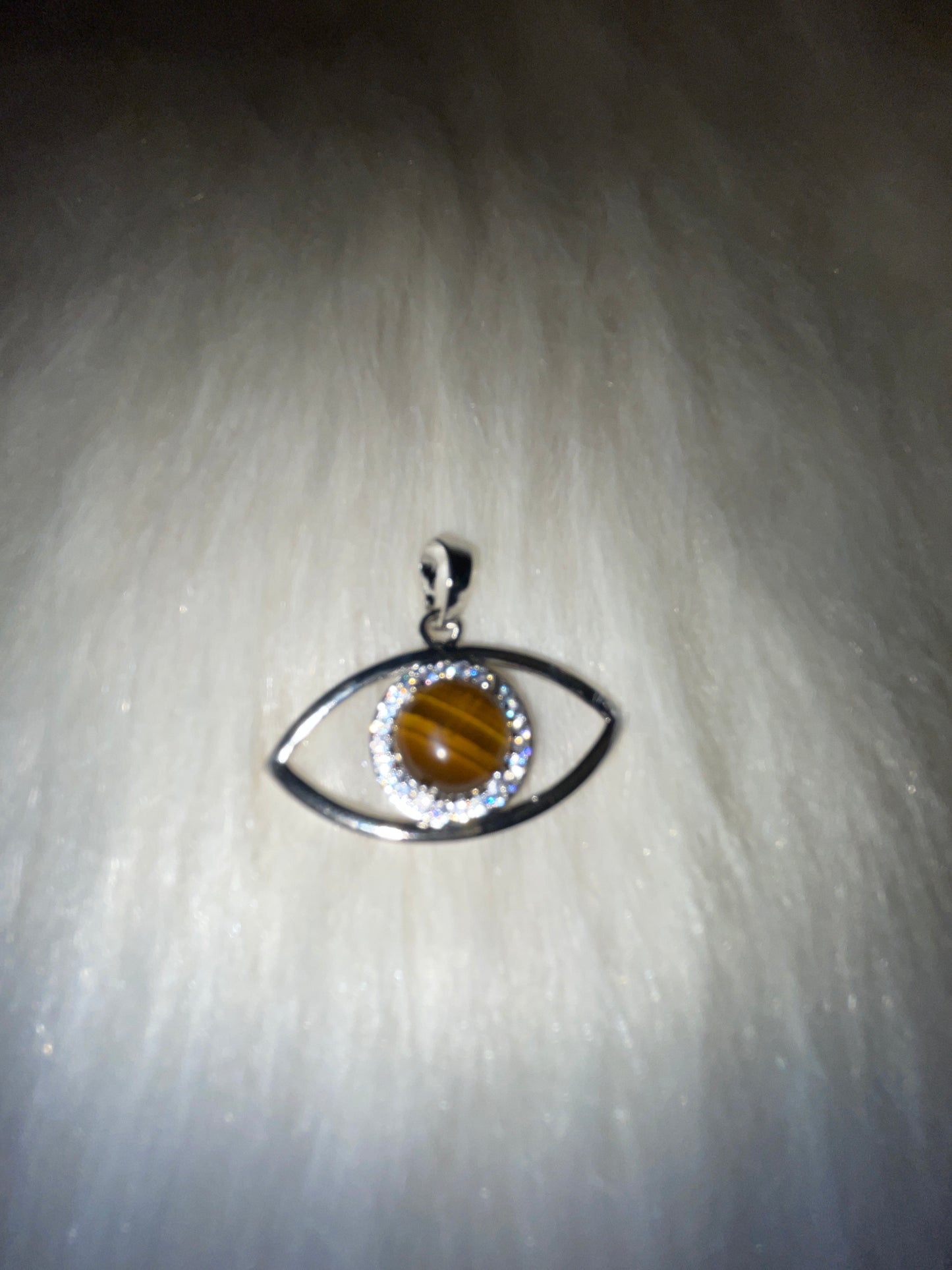 Evil eye silver tone charm with chain ( tiger eye )