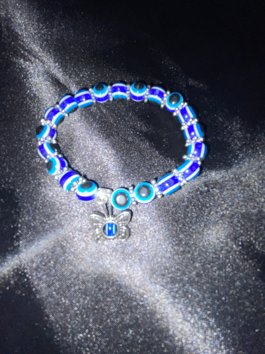 Evil eye bracelet with butterfly charm