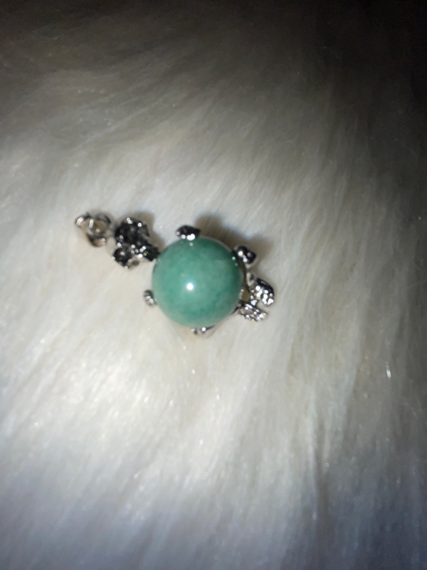 Green aventurine skull pendent