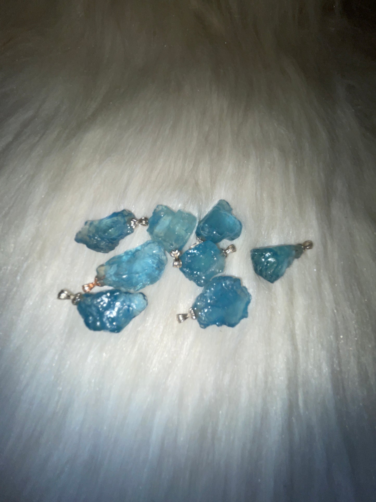 Raw aquamarine pendents in sterling silver (925)